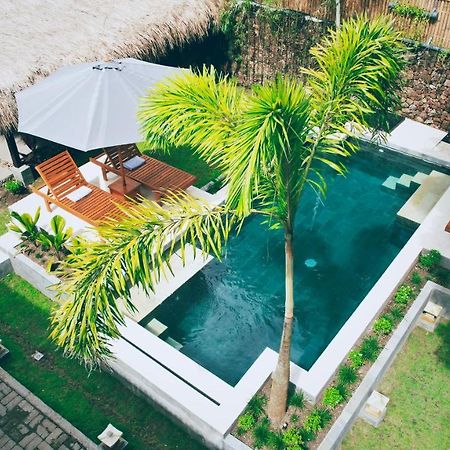 Отель Dalai Tropical Kuta  Экстерьер фото