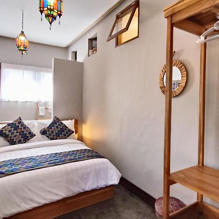 Отель Dalai Tropical Kuta  Экстерьер фото