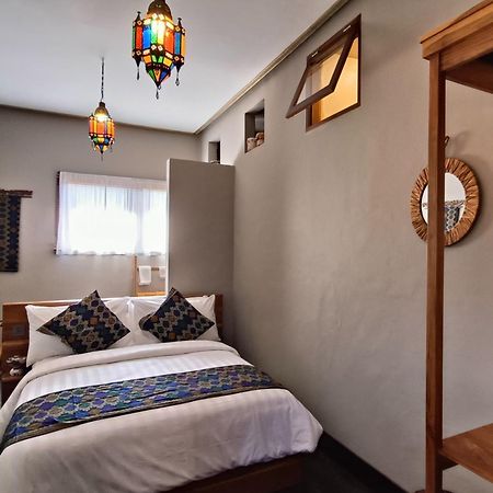 Отель Dalai Tropical Kuta  Экстерьер фото