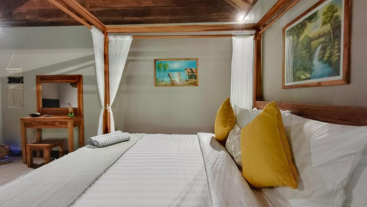 Отель Dalai Tropical Kuta  Экстерьер фото
