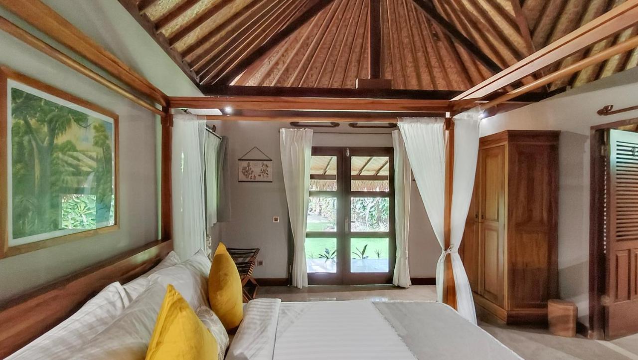Отель Dalai Tropical Kuta  Экстерьер фото