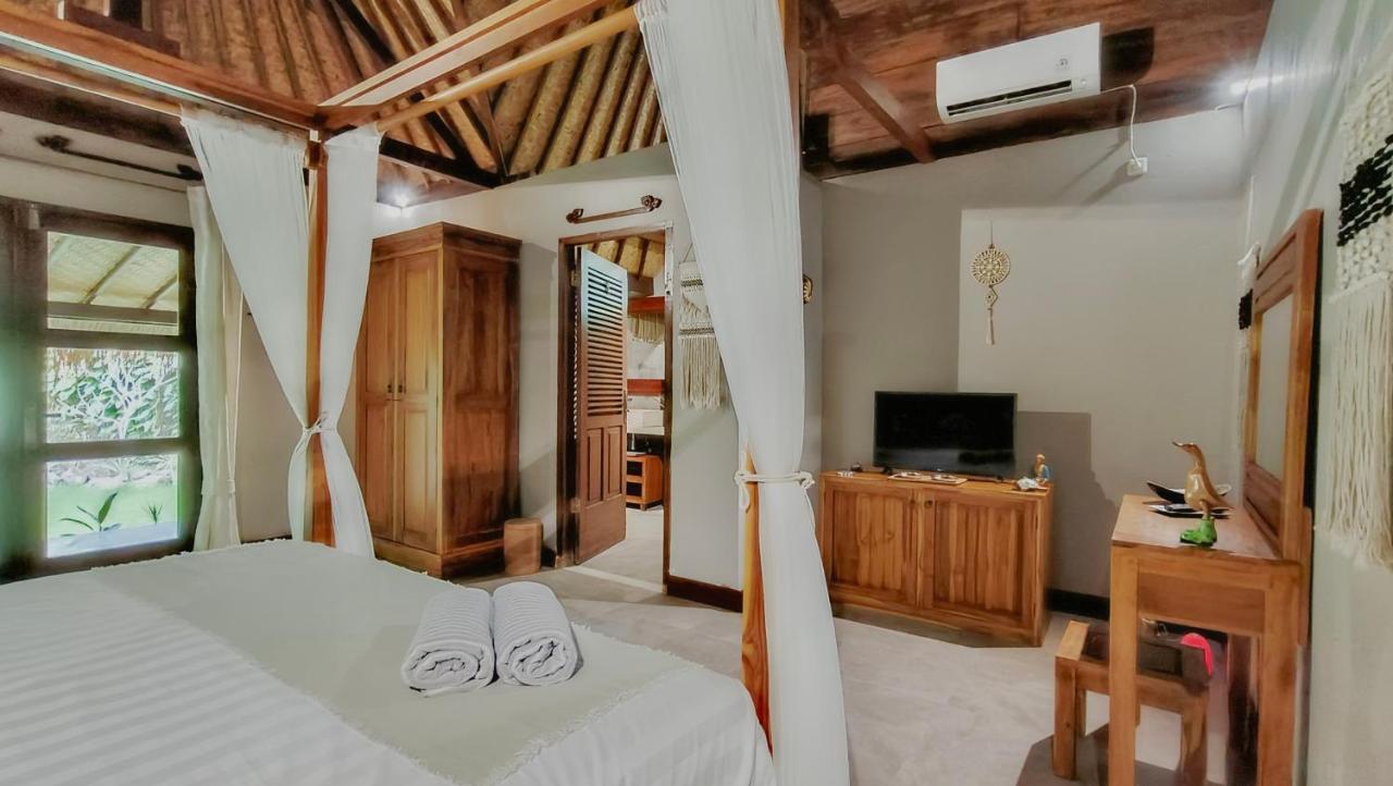 Отель Dalai Tropical Kuta  Экстерьер фото