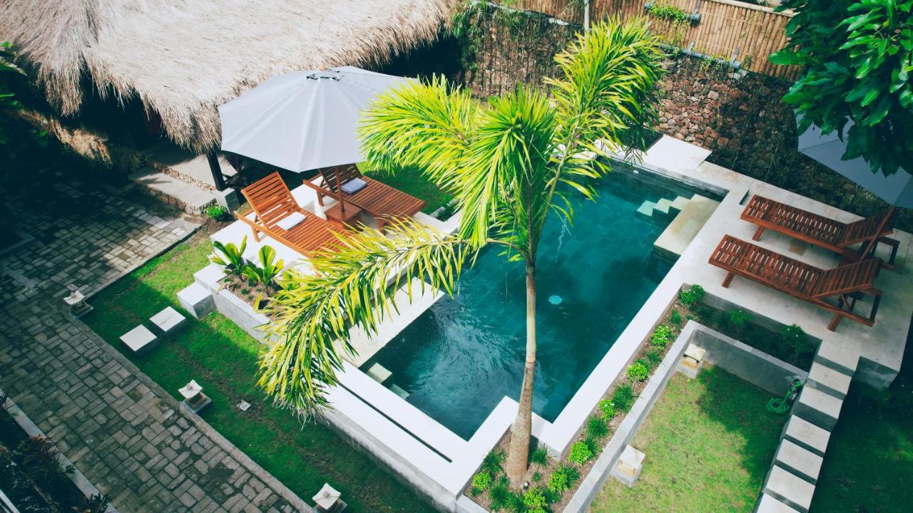 Отель Dalai Tropical Kuta  Экстерьер фото