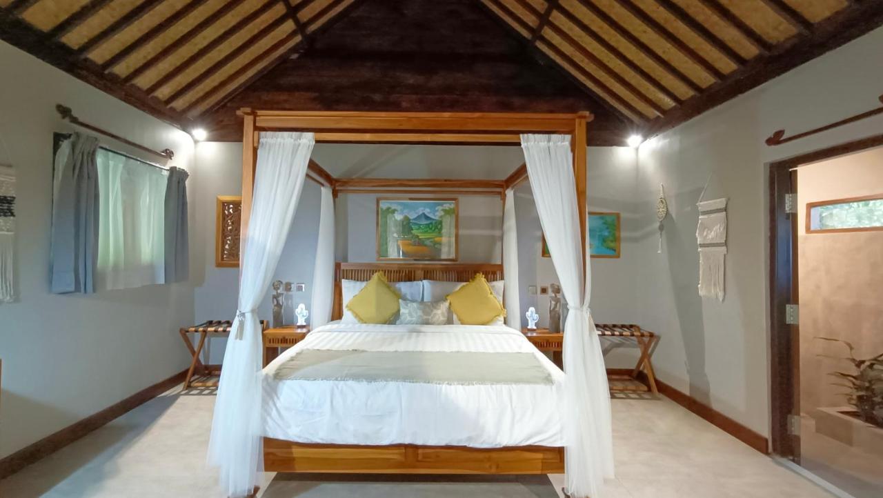 Отель Dalai Tropical Kuta  Экстерьер фото