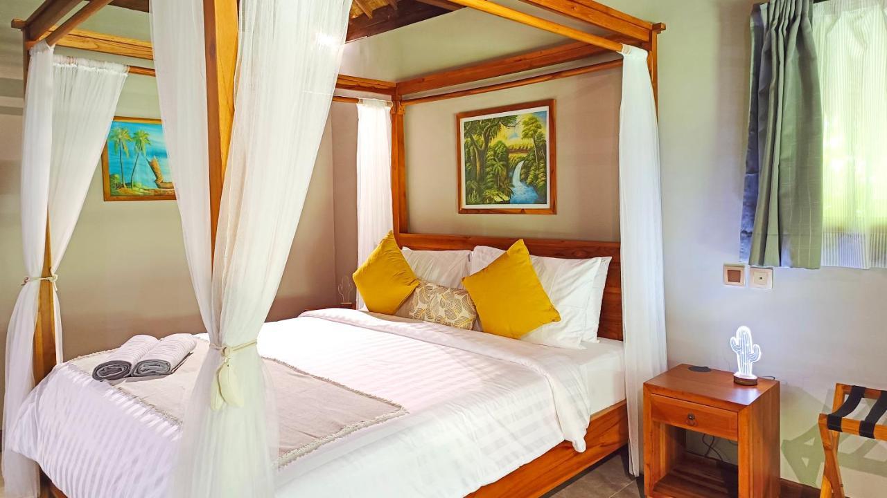 Отель Dalai Tropical Kuta  Экстерьер фото