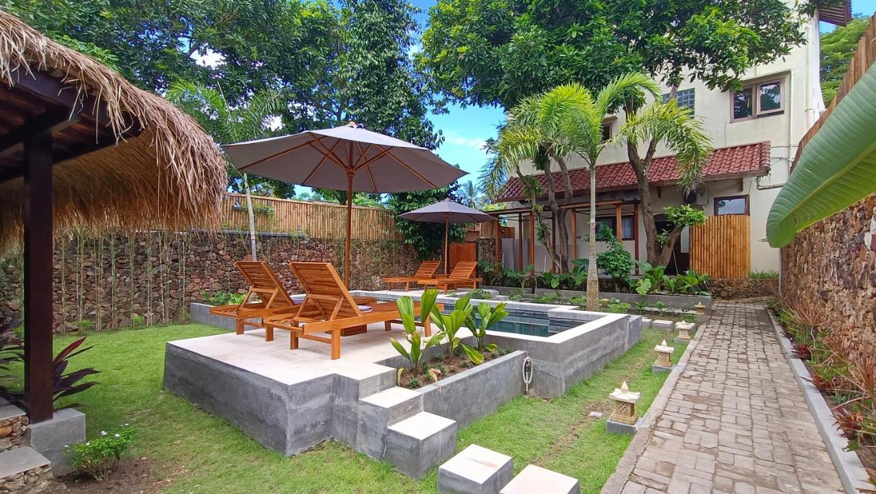 Отель Dalai Tropical Kuta  Экстерьер фото