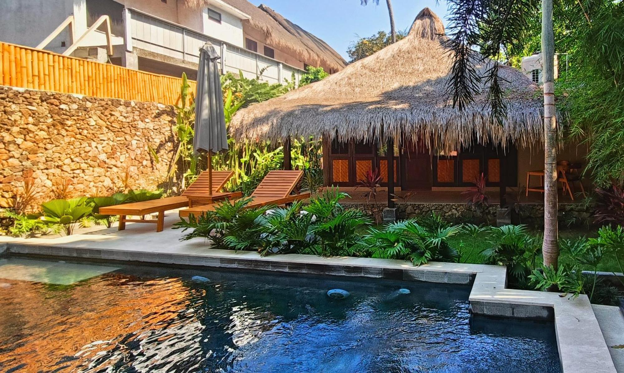 Отель Dalai Tropical Kuta  Экстерьер фото